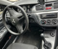 Чорний Міцубісі Lancer, об'ємом двигуна 1.58 л та пробігом 256 тис. км за 4200 $, фото 13 на Automoto.ua