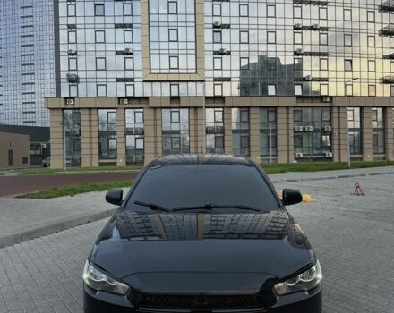 Черный Мицубиси Лансер, объемом двигателя 2 л и пробегом 242 тыс. км за 6200 $, фото 5 на Automoto.ua