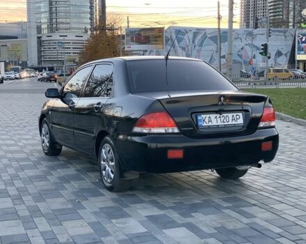 Черный Мицубиси Лансер, объемом двигателя 1.6 л и пробегом 237 тыс. км за 4300 $, фото 7 на Automoto.ua