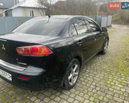 Черный Мицубиси Лансер, объемом двигателя 1.5 л и пробегом 270 тыс. км за 4999 $, фото 11 на Automoto.ua