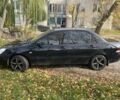 Міцубісі Lancer 2007 у Каневе на Automoto.ua Чорний Міцубісі Lancer, об'ємом двигуна 1.6 л та пробігом 310 тис. км за 4100 $, фото 1 на Automoto.ua