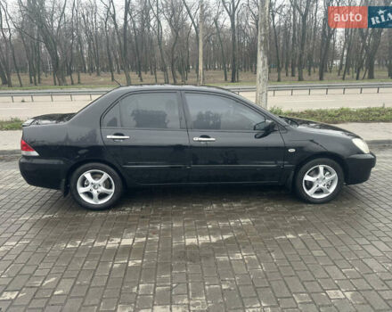 Чорний Міцубісі Lancer, об'ємом двигуна 1.6 л та пробігом 270 тис. км за 4500 $, фото 1 на Automoto.ua