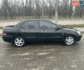 Чорний Міцубісі Lancer, об'ємом двигуна 1.6 л та пробігом 270 тис. км за 4500 $, фото 1 на Automoto.ua