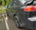 Чорний Міцубісі Lancer, об'ємом двигуна 2 л та пробігом 240 тис. км за 5700 $, фото 10 на Automoto.ua