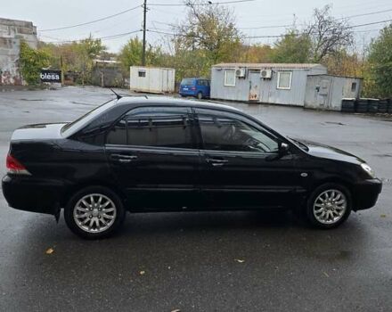 Мицубиси Лансер 2007 в Кривом Роге на Automoto.ua Черный Мицубиси Лансер, объемом двигателя 1.6 л и пробегом 200 тыс. км за 4900 $, фото 5 на Automoto.ua