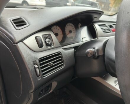 Черный Мицубиси Лансер, объемом двигателя 1.6 л и пробегом 173 тыс. км за 4700 $, фото 12 на Automoto.ua