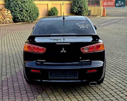 Чорний Міцубісі Lancer, об'ємом двигуна 2 л та пробігом 260 тис. км за 6555 $, фото 18 на Automoto.ua