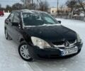 Чорний Міцубісі Lancer, об'ємом двигуна 1.6 л та пробігом 206 тис. км за 3700 $, фото 1 на Automoto.ua
