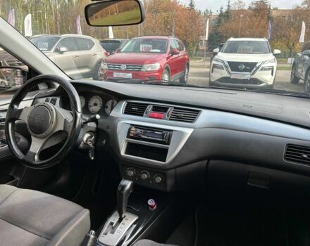 Мицубиси Лансер 2007 в Кривом Роге на Automoto.ua Черный Мицубиси Лансер, объемом двигателя 2 л и пробегом 143 тыс. км за 5400 $, фото 15 на Automoto.ua