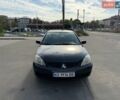 Черный Мицубиси Лансер, объемом двигателя 1.6 л и пробегом 251 тыс. км за 4000 $, фото 7 на Automoto.ua