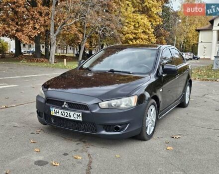 Міцубісі Lancer 2007 у Києві на Automoto.ua Чорний Міцубісі Lancer, об'ємом двигуна 2 л та пробігом 115 тис. км за 5000 $, фото 2 на Automoto.ua