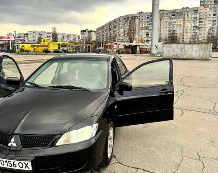 Чорний Міцубісі Lancer, об'ємом двигуна 1.6 л та пробігом 220 тис. км за 4200 $, фото 3 на Automoto.ua