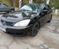 Чорний Міцубісі Lancer, об'ємом двигуна 1.6 л та пробігом 260 тис. км за 4039 $, фото 17 на Automoto.ua