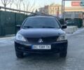 Чорний Міцубісі Lancer, об'ємом двигуна 1.6 л та пробігом 240 тис. км за 3850 $, фото 1 на Automoto.ua