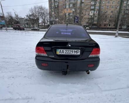 Чорний Міцубісі Lancer, об'ємом двигуна 1.6 л та пробігом 260 тис. км за 3999 $, фото 8 на Automoto.ua
