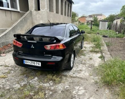 Черный Мицубиси Лансер, объемом двигателя 2 л и пробегом 200 тыс. км за 6900 $, фото 6 на Automoto.ua