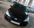 Чорний Міцубісі Lancer, об'ємом двигуна 1.6 л та пробігом 251 тис. км за 4500 $, фото 1 на Automoto.ua