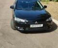 Чорний Міцубісі Lancer, об'ємом двигуна 2 л та пробігом 312 тис. км за 4200 $, фото 7 на Automoto.ua