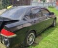 Чорний Міцубісі Lancer, об'ємом двигуна 1.6 л та пробігом 22 тис. км за 1700 $, фото 6 на Automoto.ua