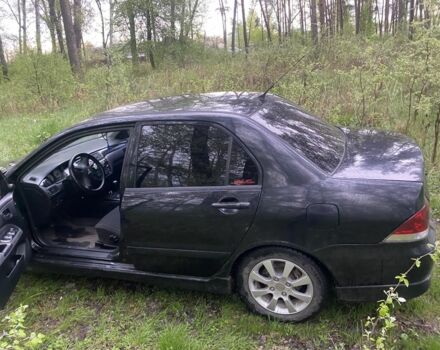 Чорний Міцубісі Lancer, об'ємом двигуна 0.16 л та пробігом 250 тис. км за 0 $, фото 2 на Automoto.ua