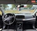 Черный Мицубиси Лансер, объемом двигателя 2 л и пробегом 360 тыс. км за 5200 $, фото 4 на Automoto.ua