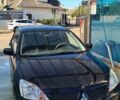 Чорний Міцубісі Lancer, об'ємом двигуна 1.6 л та пробігом 185 тис. км за 3300 $, фото 1 на Automoto.ua