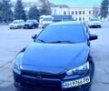 Черный Мицубиси Лансер, объемом двигателя 2 л и пробегом 250 тыс. км за 7500 $, фото 1 на Automoto.ua