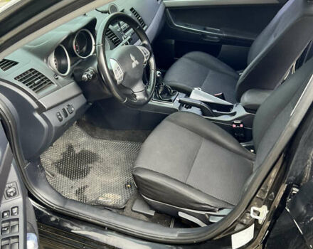Чорний Міцубісі Lancer, об'ємом двигуна 2 л та пробігом 200 тис. км за 6900 $, фото 8 на Automoto.ua