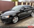 Чорний Міцубісі Lancer, об'ємом двигуна 2 л та пробігом 18800 тис. км за 6300 $, фото 1 на Automoto.ua