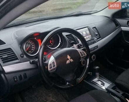 Черный Мицубиси Лансер, объемом двигателя 2 л и пробегом 116 тыс. км за 7200 $, фото 9 на Automoto.ua