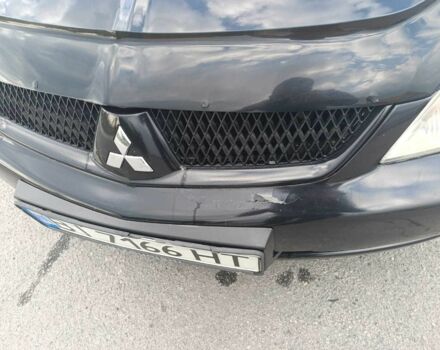 Чорний Міцубісі Lancer, об'ємом двигуна 1.6 л та пробігом 250 тис. км за 3100 $, фото 12 на Automoto.ua