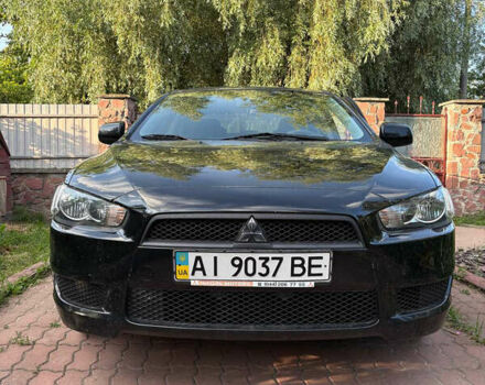 Черный Мицубиси Лансер, объемом двигателя 1.5 л и пробегом 111 тыс. км за 7500 $, фото 3 на Automoto.ua