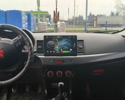 Черный Мицубиси Лансер, объемом двигателя 2 л и пробегом 160 тыс. км за 8000 $, фото 8 на Automoto.ua