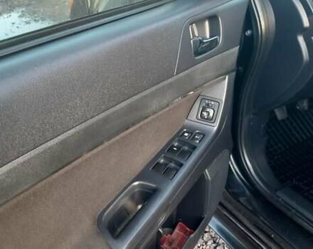 Міцубісі Lancer 2007 у Києві на Automoto.ua Чорний Міцубісі Lancer, об'ємом двигуна 2 л та пробігом 238 тис. км за 5350 $, фото 12 на Automoto.ua