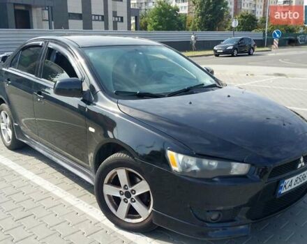 Чорний Міцубісі Lancer, об'ємом двигуна 2 л та пробігом 194 тис. км за 6500 $, фото 1 на Automoto.ua
