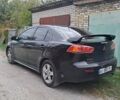 Черный Мицубиси Лансер, объемом двигателя 2 л и пробегом 277 тыс. км за 4650 $, фото 9 на Automoto.ua
