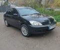 Чорний Міцубісі Lancer, об'ємом двигуна 1.58 л та пробігом 190 тис. км за 3750 $, фото 18 на Automoto.ua