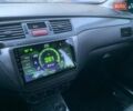 Черный Мицубиси Лансер, объемом двигателя 1.58 л и пробегом 237 тыс. км за 3950 $, фото 7 на Automoto.ua