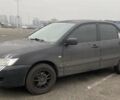 Черный Мицубиси Лансер, объемом двигателя 1.58 л и пробегом 263 тыс. км за 4000 $, фото 39 на Automoto.ua