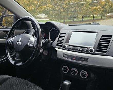 Черный Мицубиси Лансер, объемом двигателя 2 л и пробегом 115 тыс. км за 5000 $, фото 15 на Automoto.ua