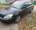 Чорний Міцубісі Lancer, об'ємом двигуна 1.58 л та пробігом 227 тис. км за 4100 $, фото 5 на Automoto.ua