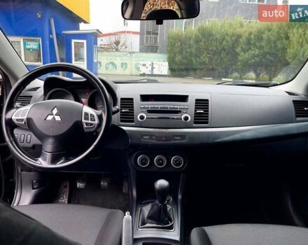 Чорний Міцубісі Lancer, об'ємом двигуна 2 л та пробігом 69 тис. км за 6200 $, фото 12 на Automoto.ua
