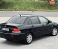 Черный Мицубиси Лансер, объемом двигателя 1.58 л и пробегом 243 тыс. км за 4950 $, фото 11 на Automoto.ua