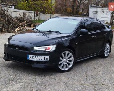 Черный Мицубиси Лансер, объемом двигателя 2 л и пробегом 230 тыс. км за 7100 $, фото 9 на Automoto.ua