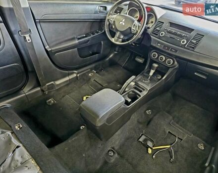 Чорний Міцубісі Lancer, об'ємом двигуна 2 л та пробігом 260 тис. км за 6555 $, фото 47 на Automoto.ua