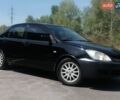 Черный Мицубиси Лансер, объемом двигателя 1.58 л и пробегом 260 тыс. км за 3800 $, фото 1 на Automoto.ua