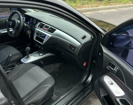 Черный Мицубиси Лансер, объемом двигателя 2 л и пробегом 260 тыс. км за 5300 $, фото 14 на Automoto.ua