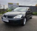 Чорний Міцубісі Lancer, об'ємом двигуна 1.58 л та пробігом 202 тис. км за 4700 $, фото 1 на Automoto.ua
