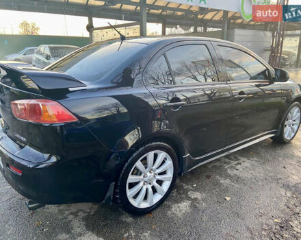 Чорний Міцубісі Lancer, об'ємом двигуна 2 л та пробігом 222 тис. км за 7500 $, фото 4 на Automoto.ua