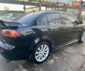 Чорний Міцубісі Lancer, об'ємом двигуна 2 л та пробігом 222 тис. км за 7500 $, фото 4 на Automoto.ua